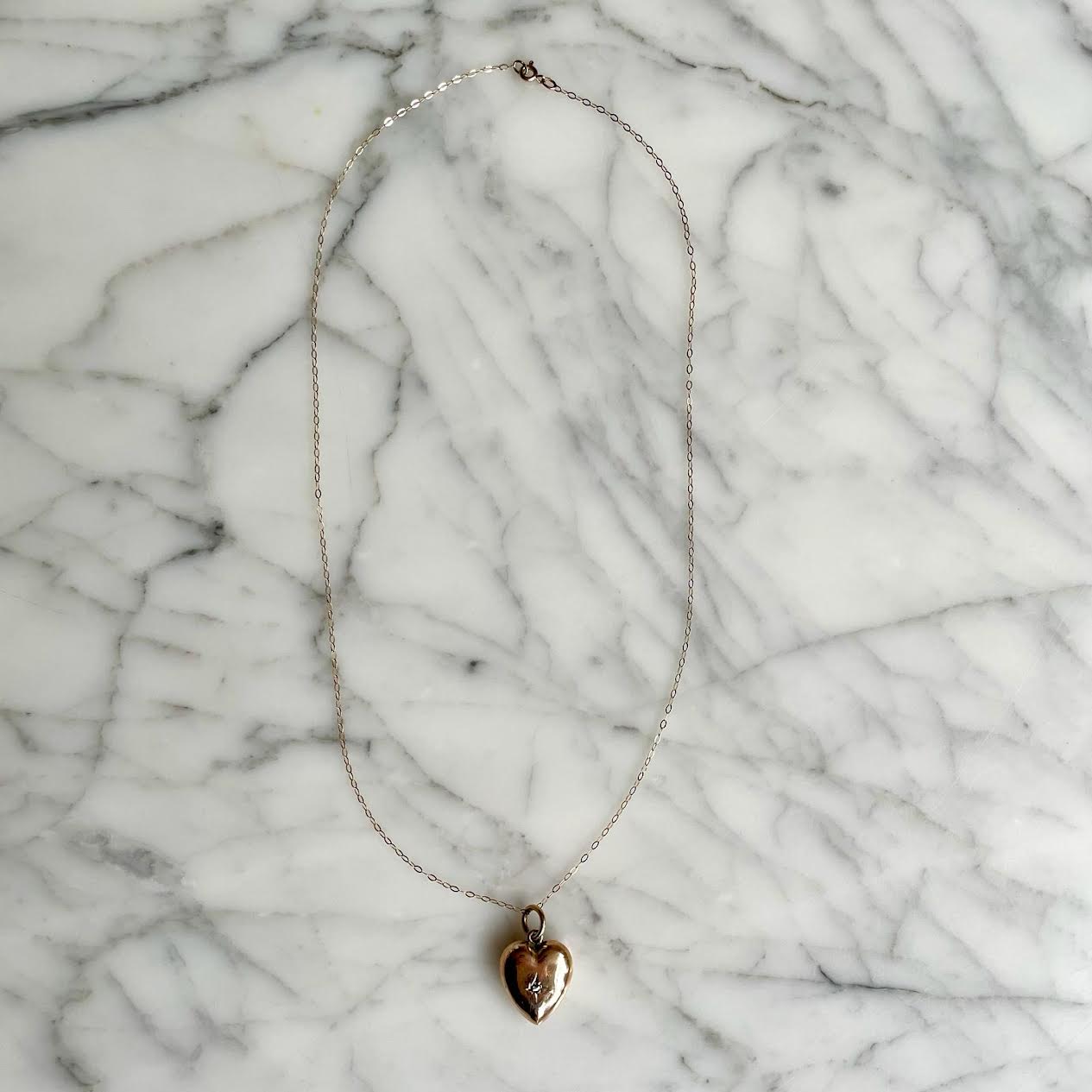 Victorian 9ct Gold Puffy Heart Pendant Necklace Featuring An Old-Cut Diamond