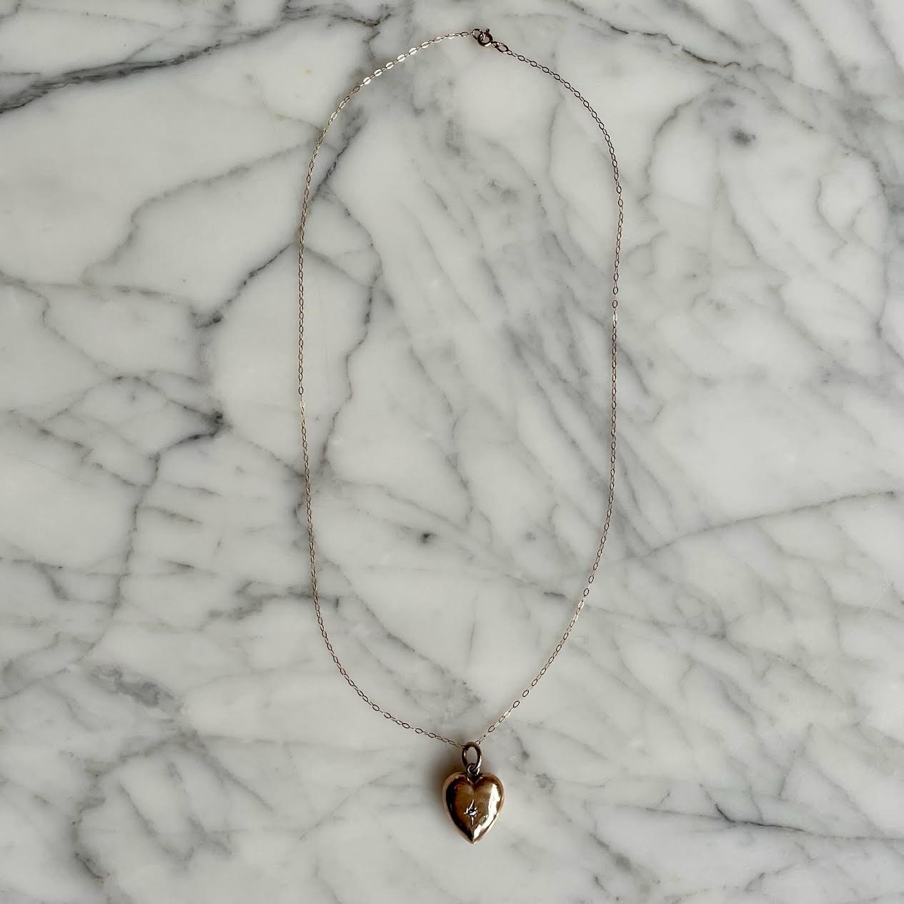 Victorian 9ct Gold Puffy Heart Pendant Necklace Featuring An Old-Cut Diamond