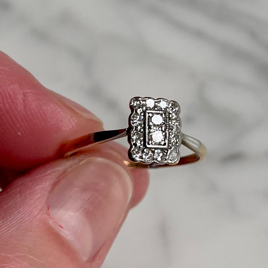 Art Deco 18k Gold and Platinum Ring featuring 12 Diamonds